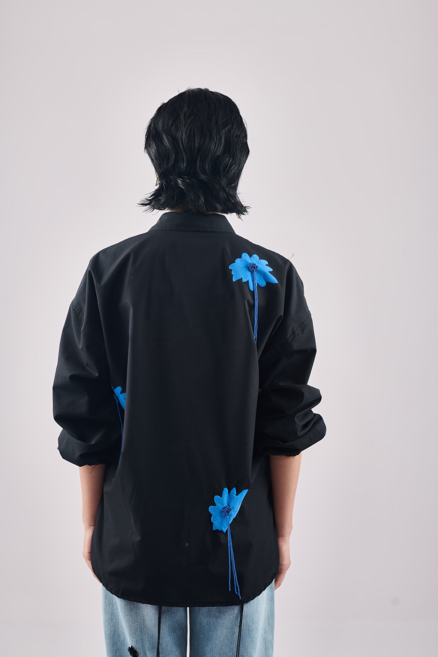 BLACK WITH BLUE BLOOM